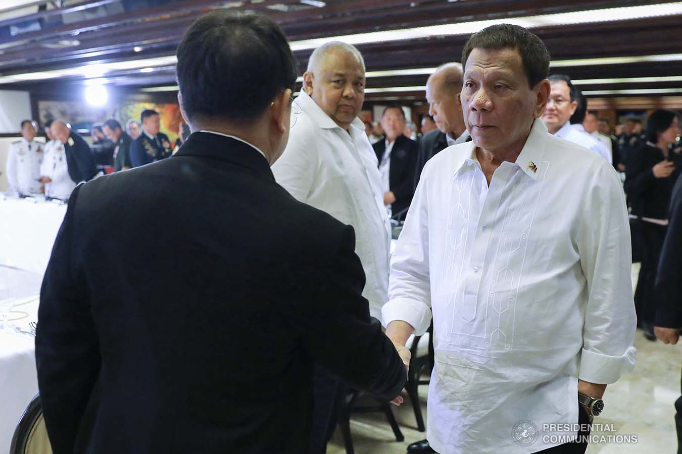 President Rodrigo Roa Duterte greets Interior and Local Government Secretary Eduardo Año prior to the start of the joint Armed Forces of the Philippines-Philippine National Police (AFP-PNP) Command Conference at the Malacañan Palace on December 9, 2019. REY BANIQUET/PRESIDENTIAL PHOTO