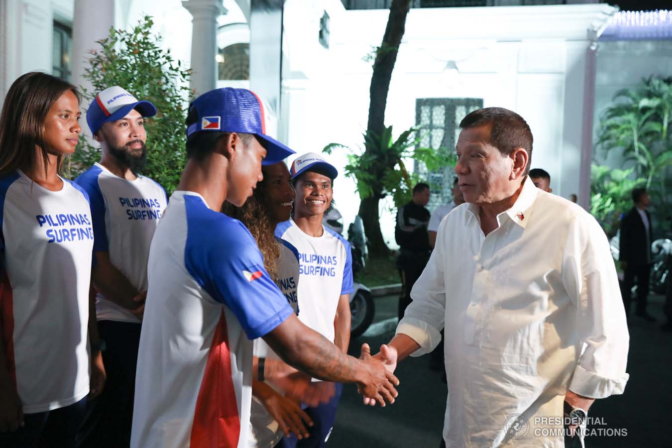President Rodrigo Roa Duterte greets Southeast Asian Games gold medalist Roger Casugay during the meeting with the Philippine Surfing Team at the Malacañan Palace on December 10, 2019. RICHARD MADELO/PRESIDENTIAL PHOTO