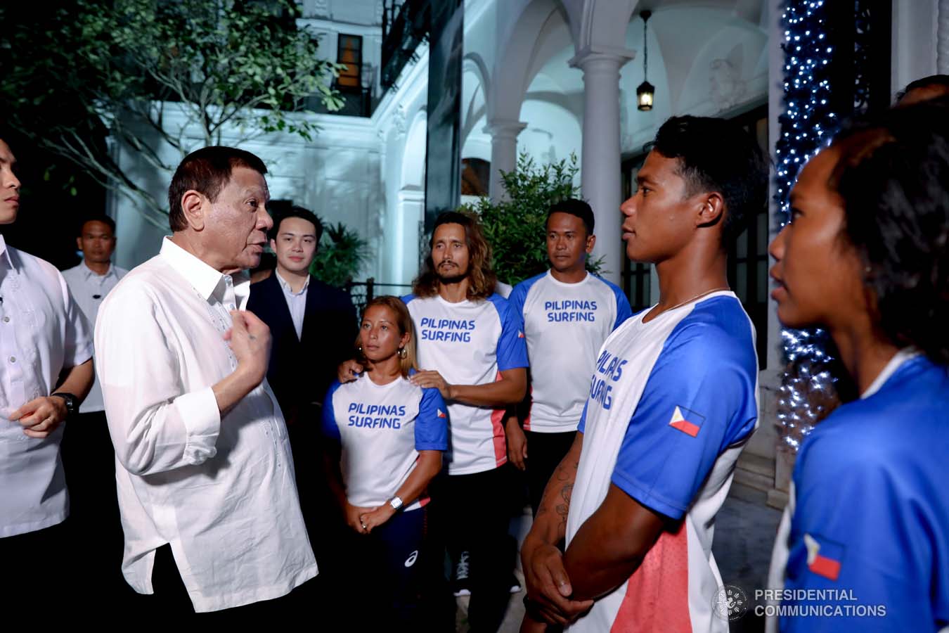 President Rodrigo Roa Duterte chats with Southeast Asian Games gold medalist Roger Casugay during a meeting with the Philippine Surfing Team at the Malacañan Palace on December 10, 2019. RICHARD MADELO/PRESIDENTIAL PHOTO