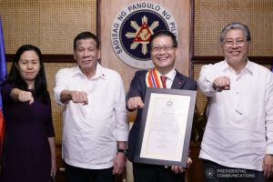 President Rodrigo Roa Duterte strikes his signature pose with outgoing Ambassador of the Socialist Republic of Vietnam to the Philippines Ly Quoc Tuan, who was awarded the Order of Sikatuna with the Rank of Datu during his farewell call to the President at the Malacañan Palace on December 11, 2019. KING RODRIGUEZ/PRESIDENTIAL PHOTO