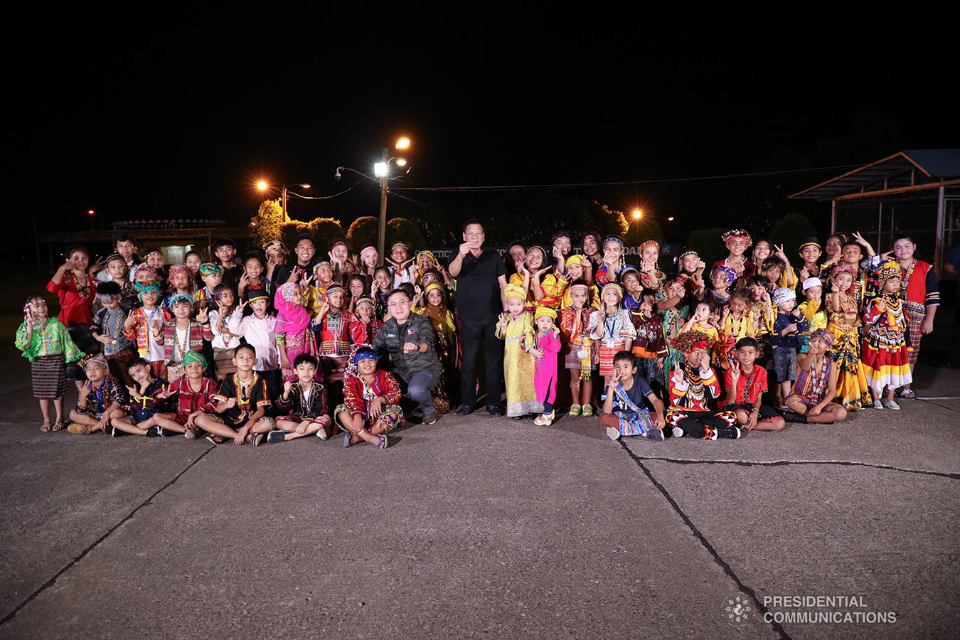 President Rodrigo Roa Duterte poses for posterity with the children from various Indigenous Peoples tribes in Mindanao at the Tactical Operations Group (TOG)-11 in Davao City on December 14, 2019. ACE MORANDANTE/PRESIDENTIAL PHOTO