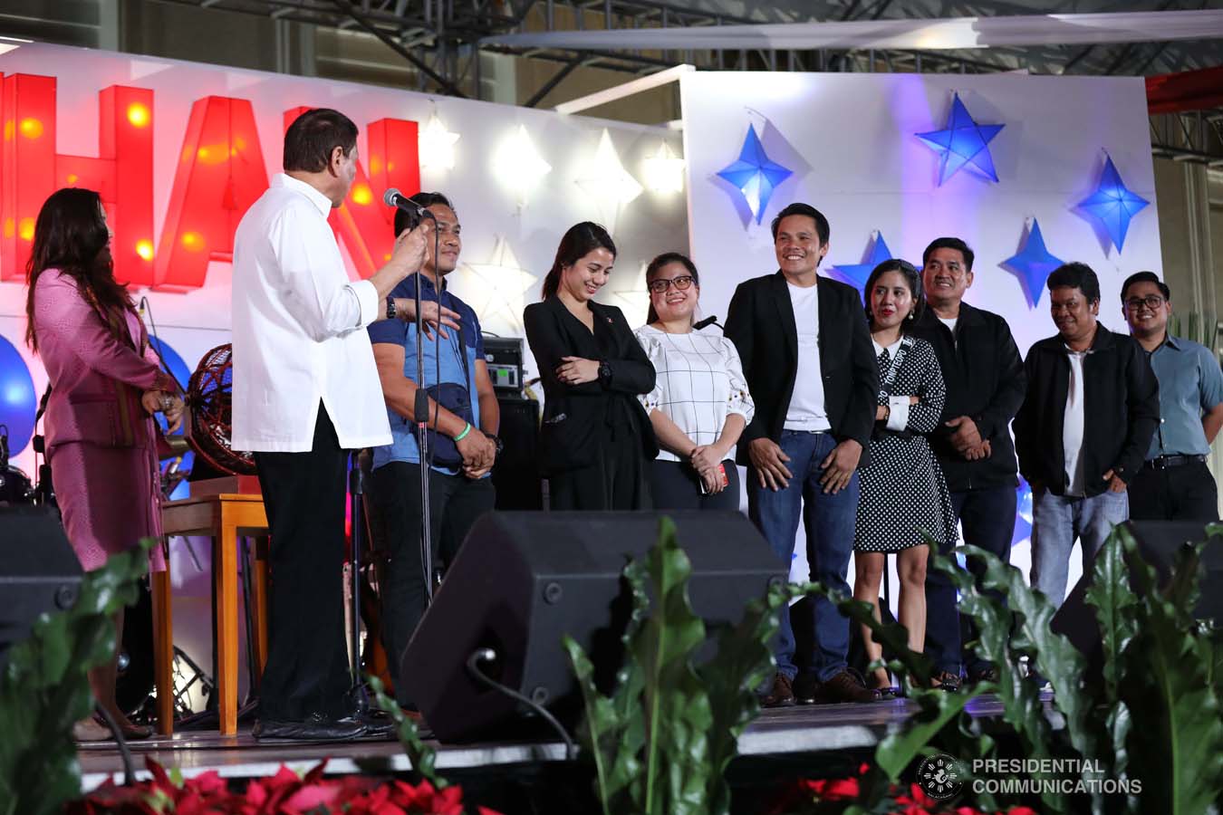 President Rodrigo Roa Duterte shares a light moment with the winners of the raffle during the Office of the President Christmas Party at the Malacañan Palace on December 18, 2019. SIMEON CELI JR./PRESIDENTIAL PHOTO