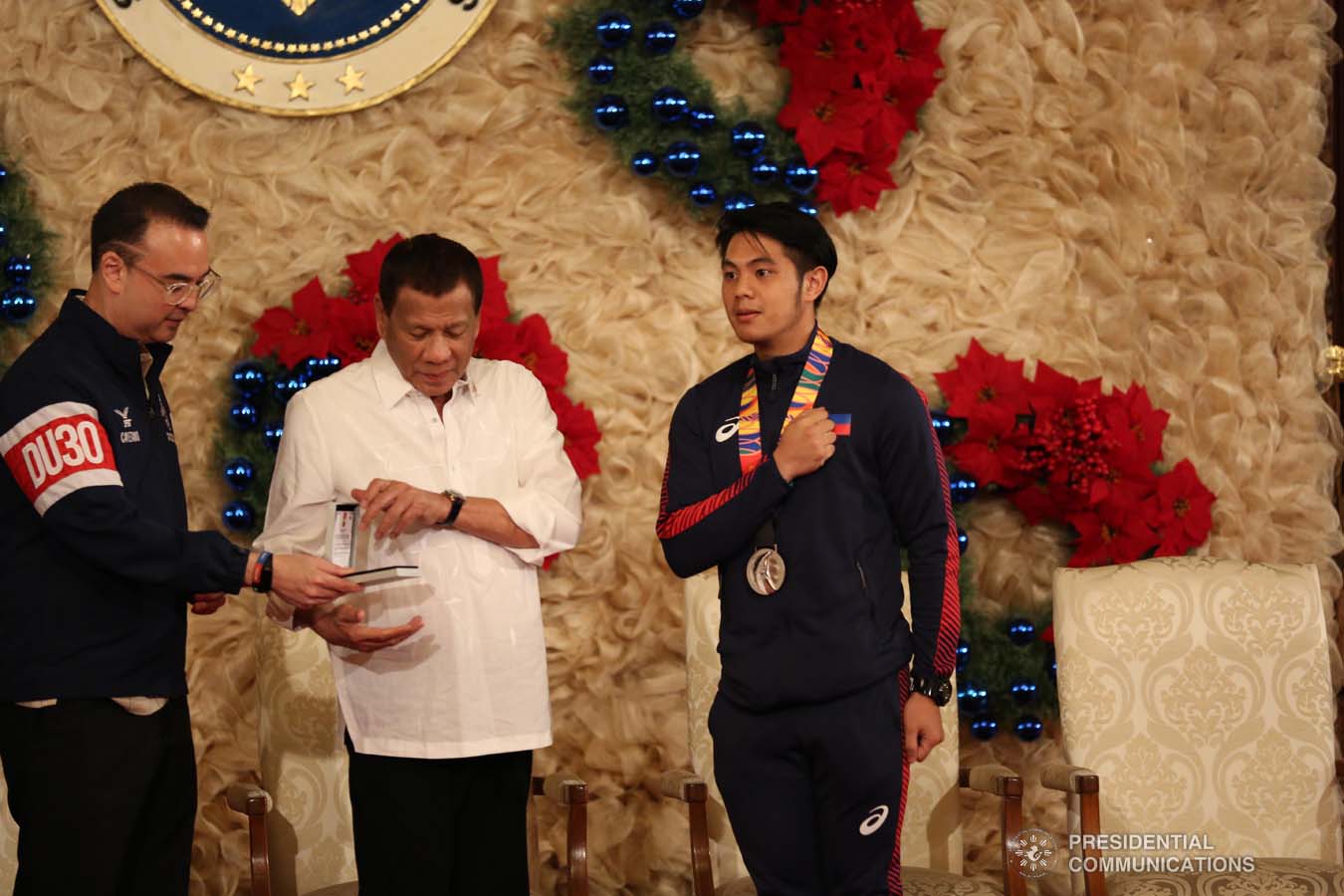 President Rodrigo Roa Duterte confers the Order of Lapu-Lapu Rank of Kamagi on one of the 2019 Southeast Asian Games medalists at the Malacañan Palace on December 18, 2019. KARL NORMAN ALONZO/PRESIDENTIAL PHOTO