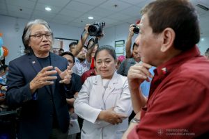 President Rodrigo Roa Duterte chats with Southern Philippines Medical Center (SPMC) Chief Dr. Leopoldo Vega and SPMC Children's Cancer Institute Section Head Dr. Mae Dolendo during his visit to the pediatric cancer patients at the SPMC-CCI in Davao City on December 28, 2019. KARL NORMAN ALONZO/PRESIDENTIAL PHOTO