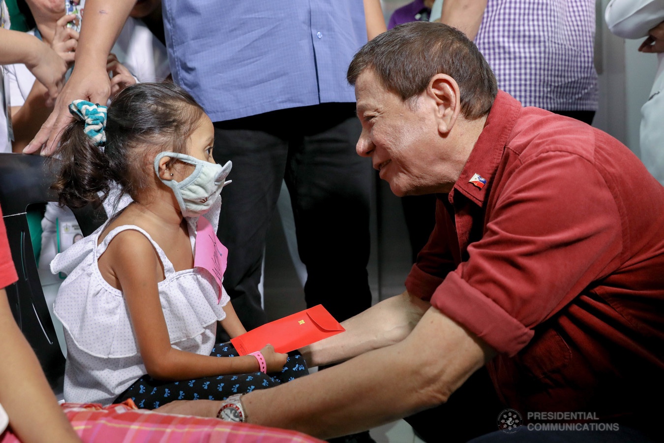 President Rodrigo Roa Duterte interacts with one of the pediatric cancer patients he visited at the Southern Philippines Medical Center Children's Cancer Institute in Davao City on December 28, 2019. KARL NORMAN ALONZO/PRESIDENTIAL PHOTO