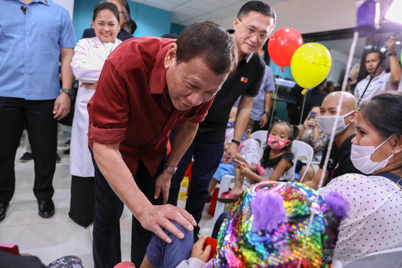 President Rodrigo Roa Duterte interacts with one of the pediatric cancer patients he visited at the Southern Philippines Medical Center Children's Cancer Institute in Davao City on December 28, 2019. KARL NORMAN ALONZO/PRESIDENTIAL PHOTO