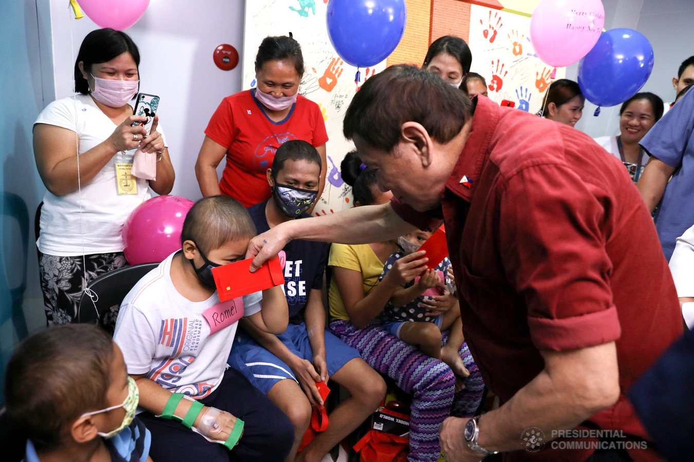 President Rodrigo Roa Duterte interacts with one of the pediatric cancer patients he visited at the Southern Philippines Medical Center Children's Cancer Institute in Davao City on December 28, 2019. KARL NORMAN ALONZO/PRESIDENTIAL PHOTO