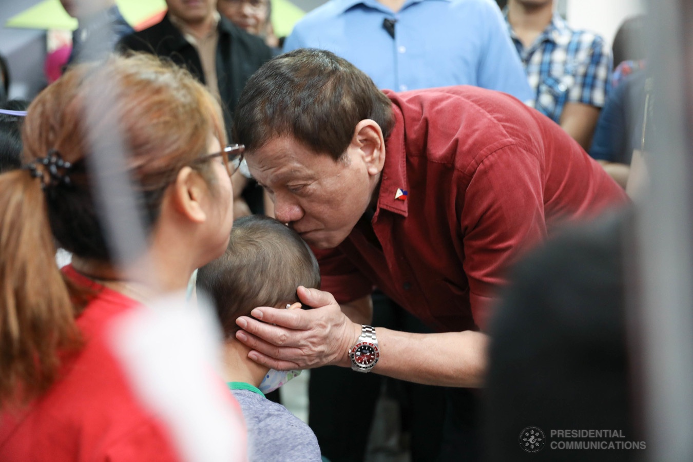 President Rodrigo Roa Duterte plants a kiss on the forehead of one of the pediatric cancer patients he visited at the Southern Philippines Medical Center Children's Cancer Institute in Davao City on December 28, 2019. KARL NORMAN ALONZO/PRESIDENTIAL PHOTO