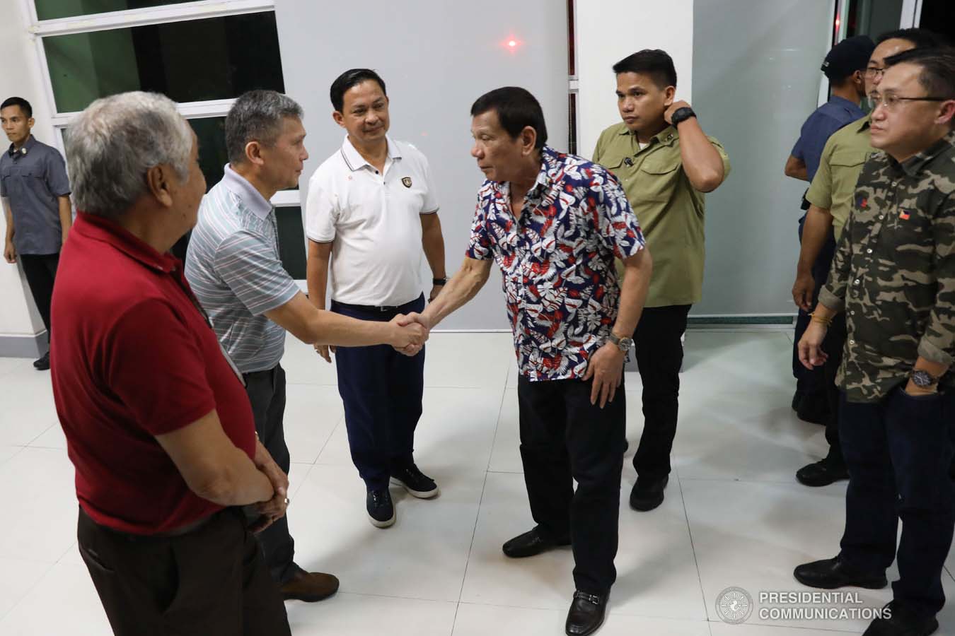 President Rodrigo Roa Duterte is welcomed by Office of Civil Defense Administrator Ricardo Jalad upon his arrival at the Legazpi City Convention Center for the situation briefing on the effects of Typhoon Tisoy on December 5, 2019. ROBINSON NIÑAL JR./PRESIDENTIAL PHOTO