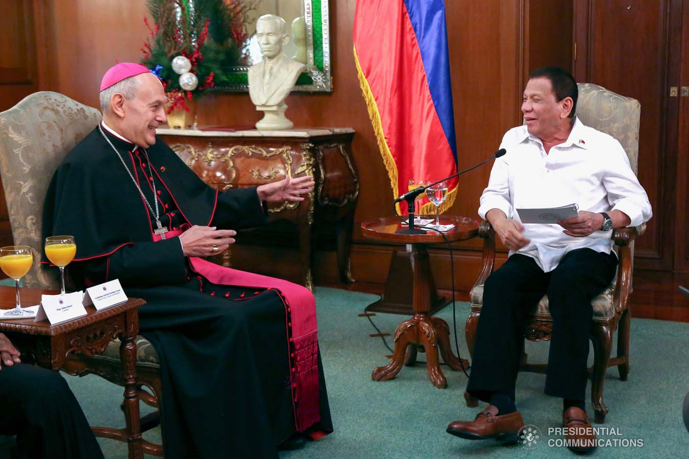 President Rodrigo Roa Duterte shares a light moment with outgoing Apostolic Nuncio of the Holy See to the Philippines Archbishop Gabriele Caccia, who paid a farewell call to the President at the Malacañan Palace on December 11, 2019. ROBINSON NIÑAL JR./PRESIDENTIAL PHOTO