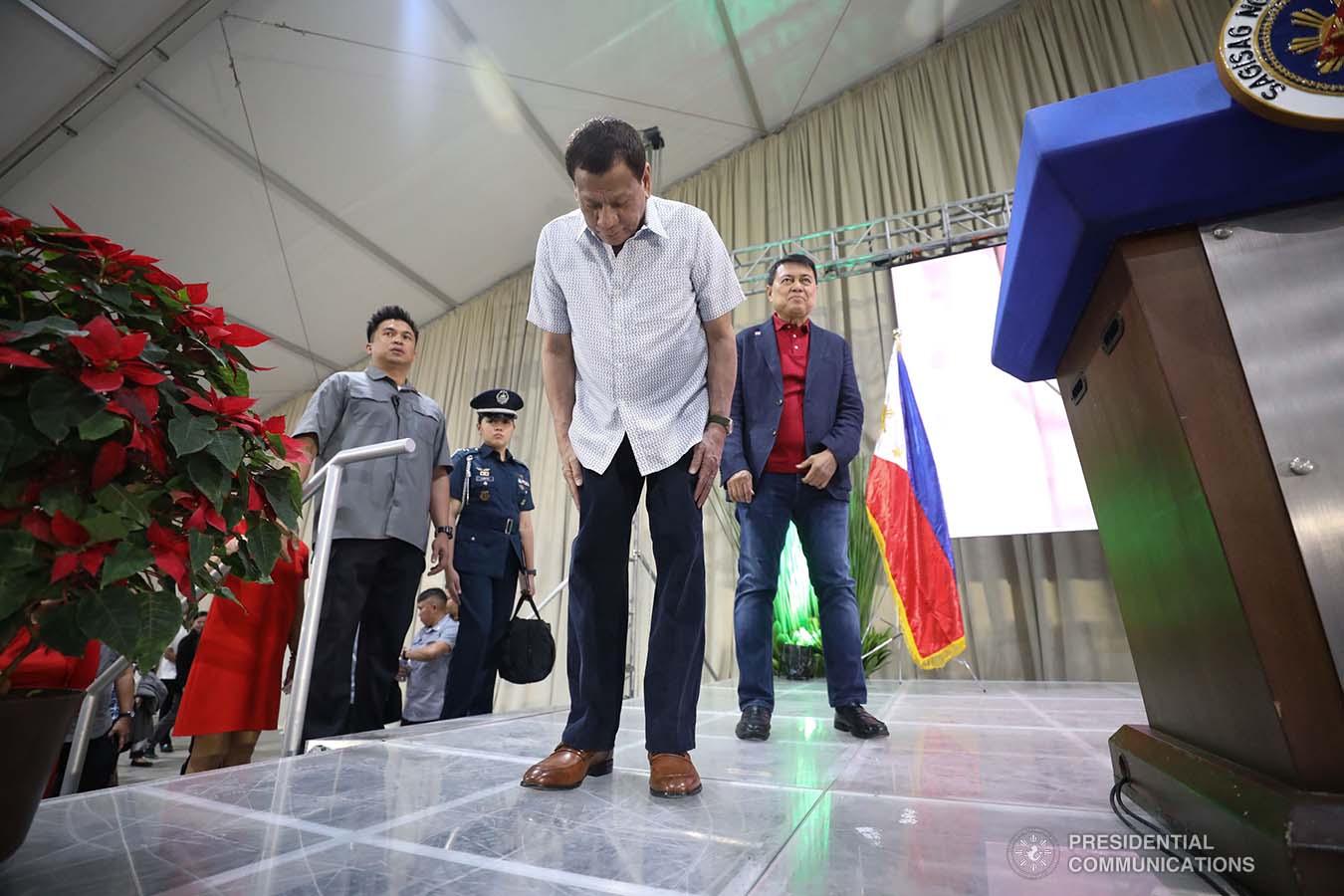 President Rodrigo Roa Duterte takes a bow before the guests during the inauguration of The Tent at Vista Global South and the birthday celebration of former Senate President Manuel Villar in Las Piñas City on December 12, 2019. SIMEON CELI JR./PRESIDENTIAL PHOTO