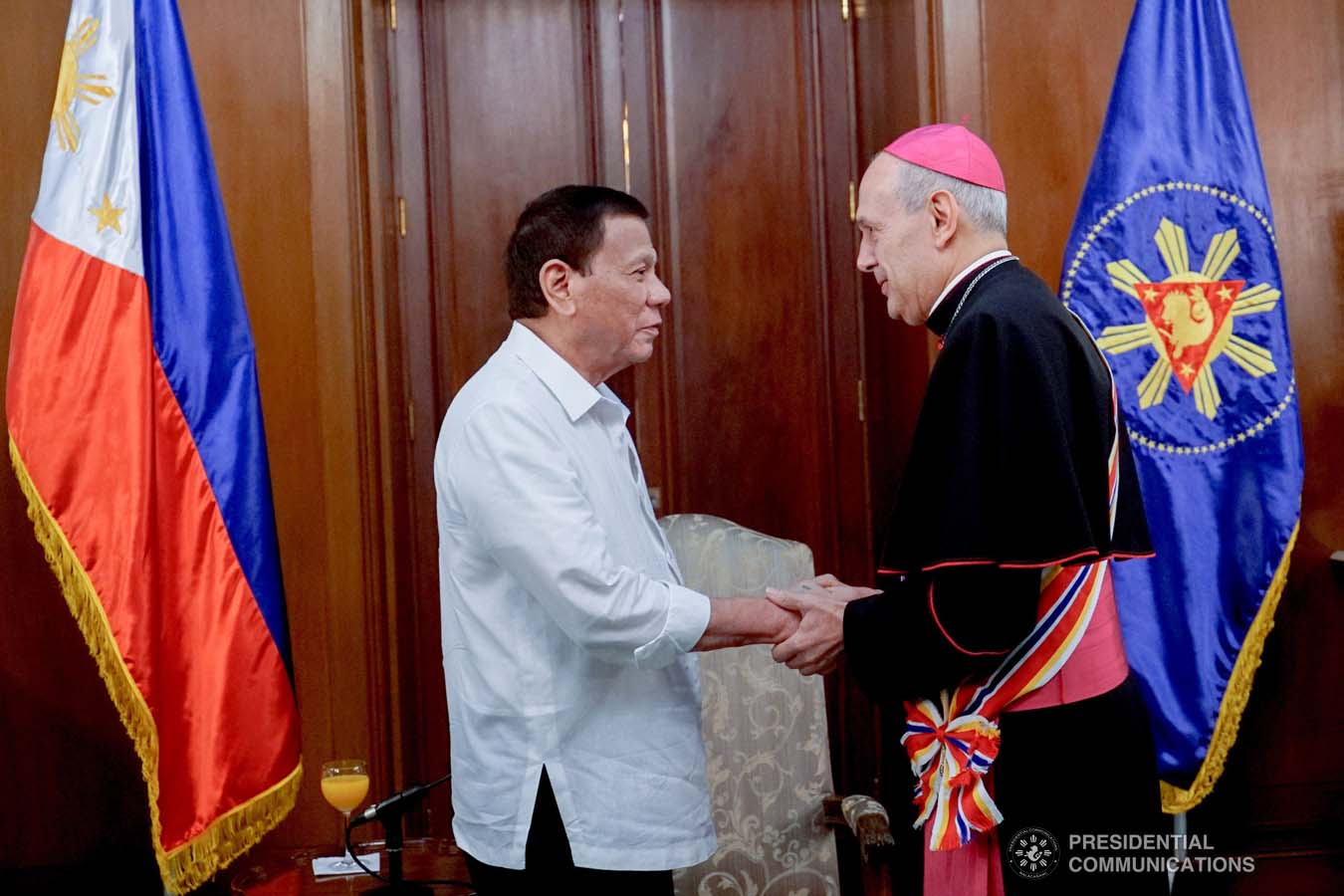 President Rodrigo Roa Duterte confers the Order of Sikatuna with the Rank of Datu on outgoing Apostolic Nuncio of the Holy See to the Philippines Archbishop Gabriele Caccia during his farewell call to the President at the Malacañan Palace on December 11, 2019. KING RODRIGUEZ/PRESIDENTIAL PHOTO