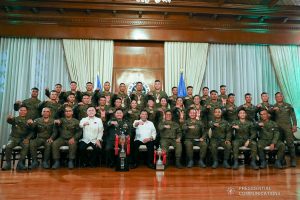 President Rodrigo Roa Duterte strikes his signature pose with the Philippine Army Team during their meeting at the  Malacañan Palace on December 9, 2019. The President has announced the P500,000 incentive to the team for their sterling performance in the ASEAN Armies Rifle Meet 2019 held recently in Indonesia. KARL NORMAN ALONZO/PRESIDENTIAL PHOTO