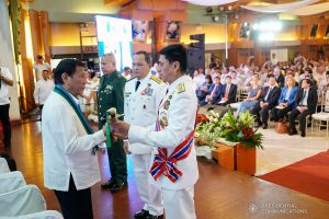 President Rodrigo Roa Duterte receives the Armed Forces of the Philippines (AFP) Command Saber from outgoing AFP Chief of Staff General Noel Clement during the AFP Change of Command ceremony at Camp General Emilio Aguinaldo in Quezon City on January 4, 2020. KING RODRIGUEZ/PRESIDENTIAL PHOTO