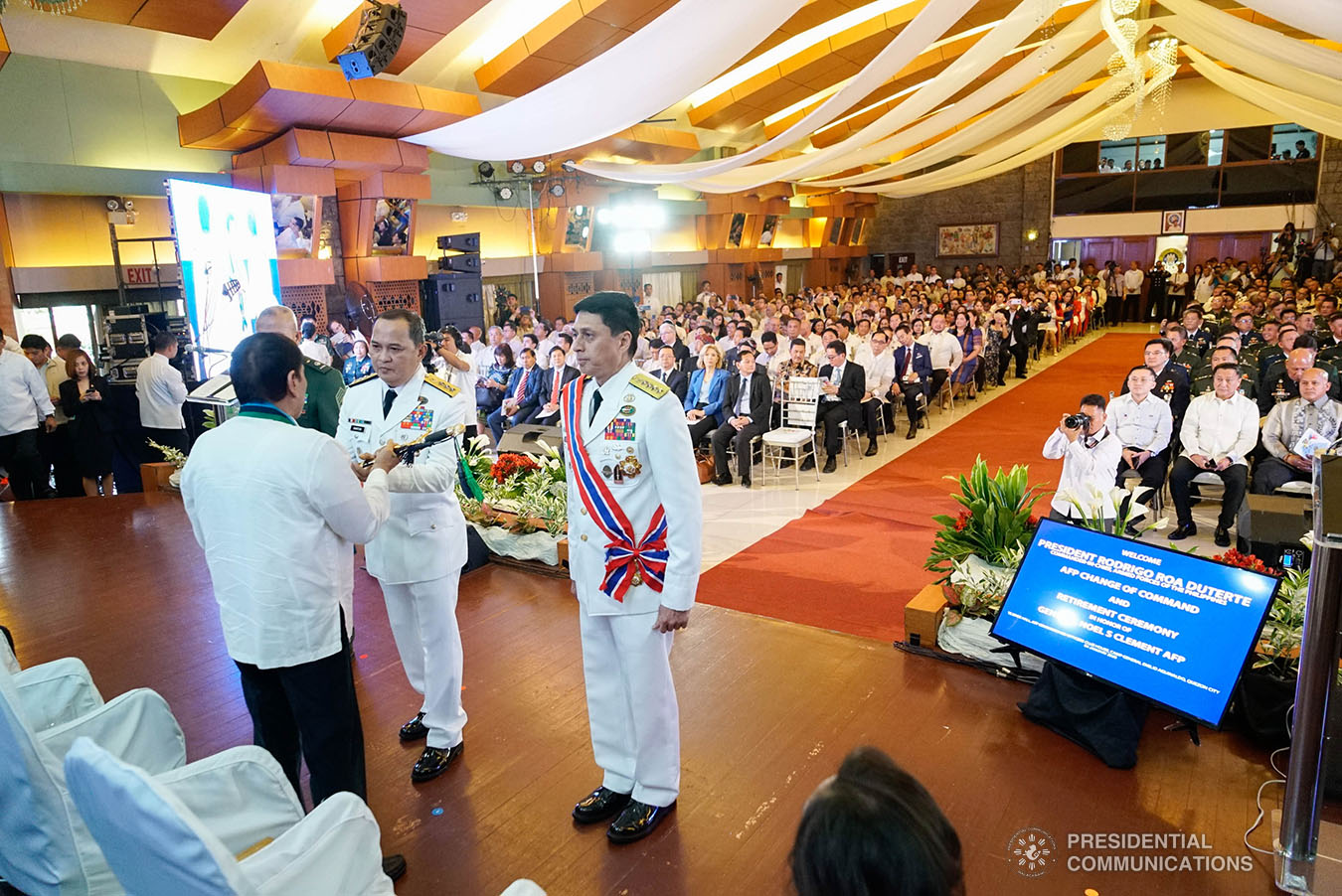 President Rodrigo Roa Duterte hands over the Armed Forces of the Philippines (AFP) Command Saber to newly installed AFP Chief of Staff Lieutenant General Felimon Santos during the AFP Change of Command ceremony at Camp General Emilio Aguinaldo in Quezon City on January 4, 2020. KING RODRIGUEZ/PRESIDENTIAL PHOTO