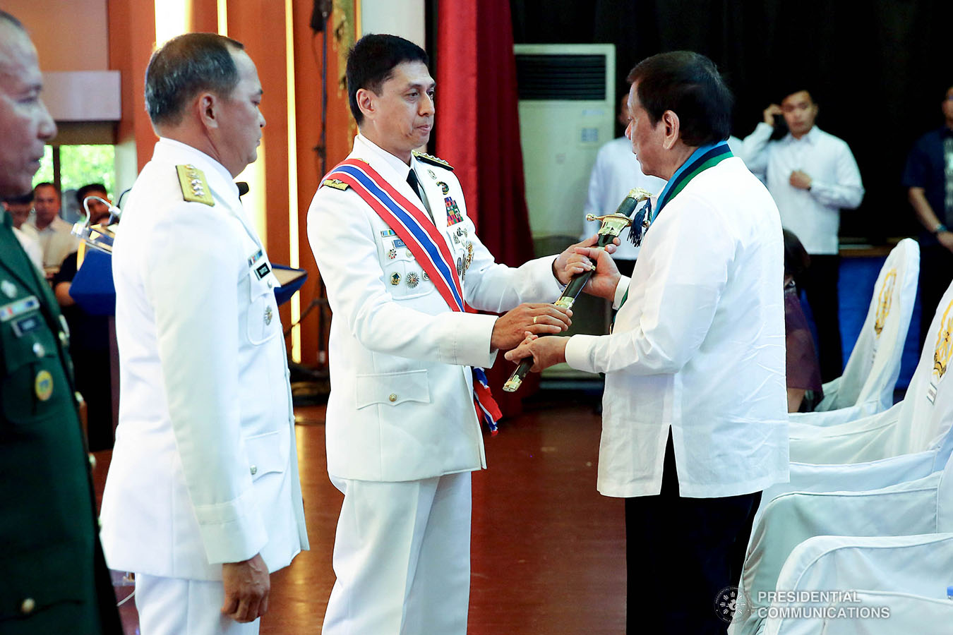 President Rodrigo Roa Duterte receives the Armed Forces of the Philippines (AFP) Command Saber from outgoing AFP Chief of Staff General Noel Clement during the AFP Change of Command ceremony at Camp General Emilio Aguinaldo in Quezon City on January 4, 2020. REY BANIQUET/PRESIDENTIAL PHOTO