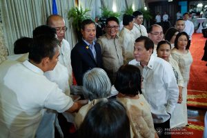 President Rodrigo Roa Duterte greets some of the newly-appointed government officials during the oath-taking ceremony at the Malacañan Palace on January 8, 2020. KING RODRIGUEZ/PRESIDENTIAL PHOTO
