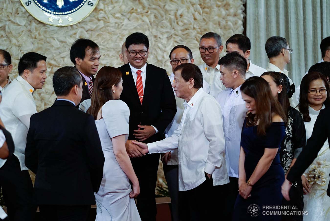 President Rodrigo Roa Duterte greets some of the newly-appointed government officials during the oath-taking ceremony at the Malacañan Palace on January 8, 2020. KING RODRIGUEZ/PRESIDENTIAL PHOTO