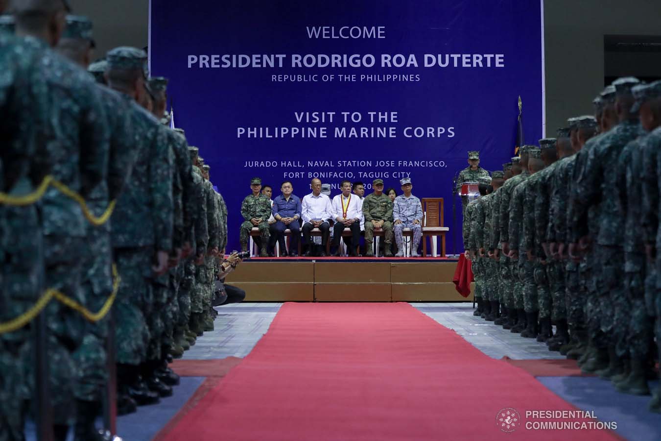 President Rodrigo Roa Duterte listens to the message of Philippine Marine Corps (PMC) Commandant Major General Nathaniel Casem during his visit to the PMC headquarters at Fort Bonifacio in Taguig City on January 13, 2020. ALFRED FRIAS/PRESIDENTIAL PHOTO