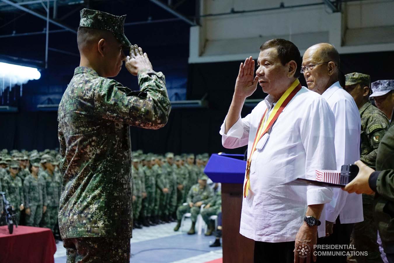 President Rodrigo Roa Duterte salutes one of the Philippine Marine Corps (PMC) personnel, who was conferred with the Order of Lapu-Lapu Rank of Kamagi, during his visit to the PMC headquarters at Fort Bonifacio in Taguig City on January 13, 2020. The President honored the PMC personnel who took part in the liberation of Marawi City from the terrorists. KING RODRIGUEZ/PRESIDENTIAL PHOTO