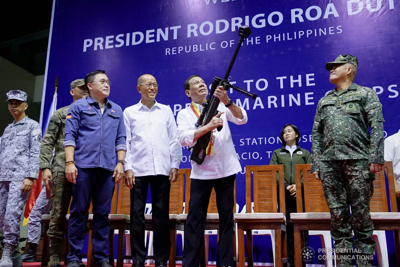 President Rodrigo Roa Duterte inspects one of the sniper rifles he turned over to the Philippine Marine Corps during his visit at Fort Bonifacio in Taguig City on January 13, 2020. KING RODRIGUEZ/PRESIDENTIAL PHOTO