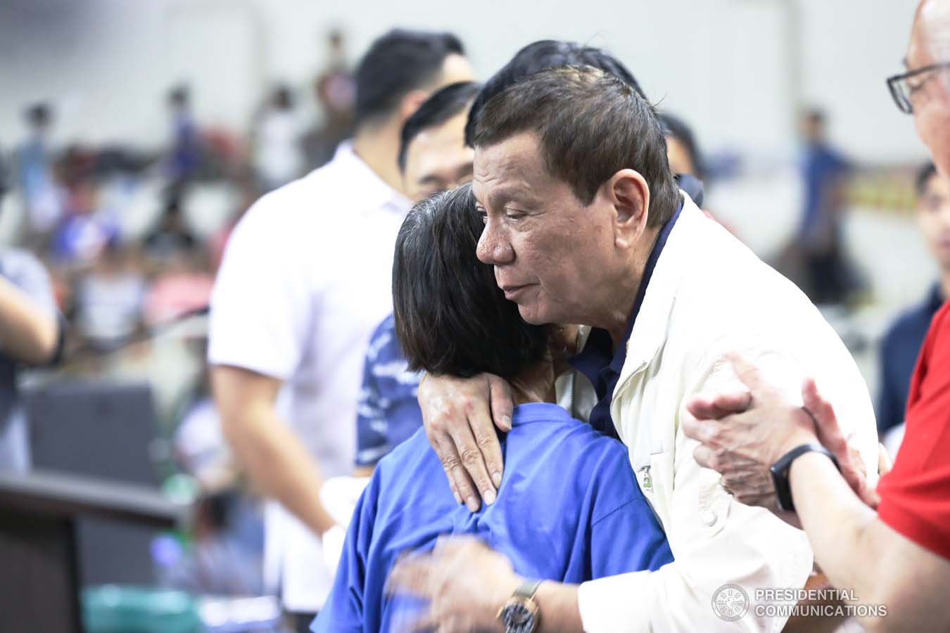 President Rodrigo Roa Duterte embraces one of the victims affected by the Taal Volcano eruption during his visit at the Batangas City Sports Coliseum on January 14, 2020. ACE MORANDANTE/PRESIDENTIAL PHOTO