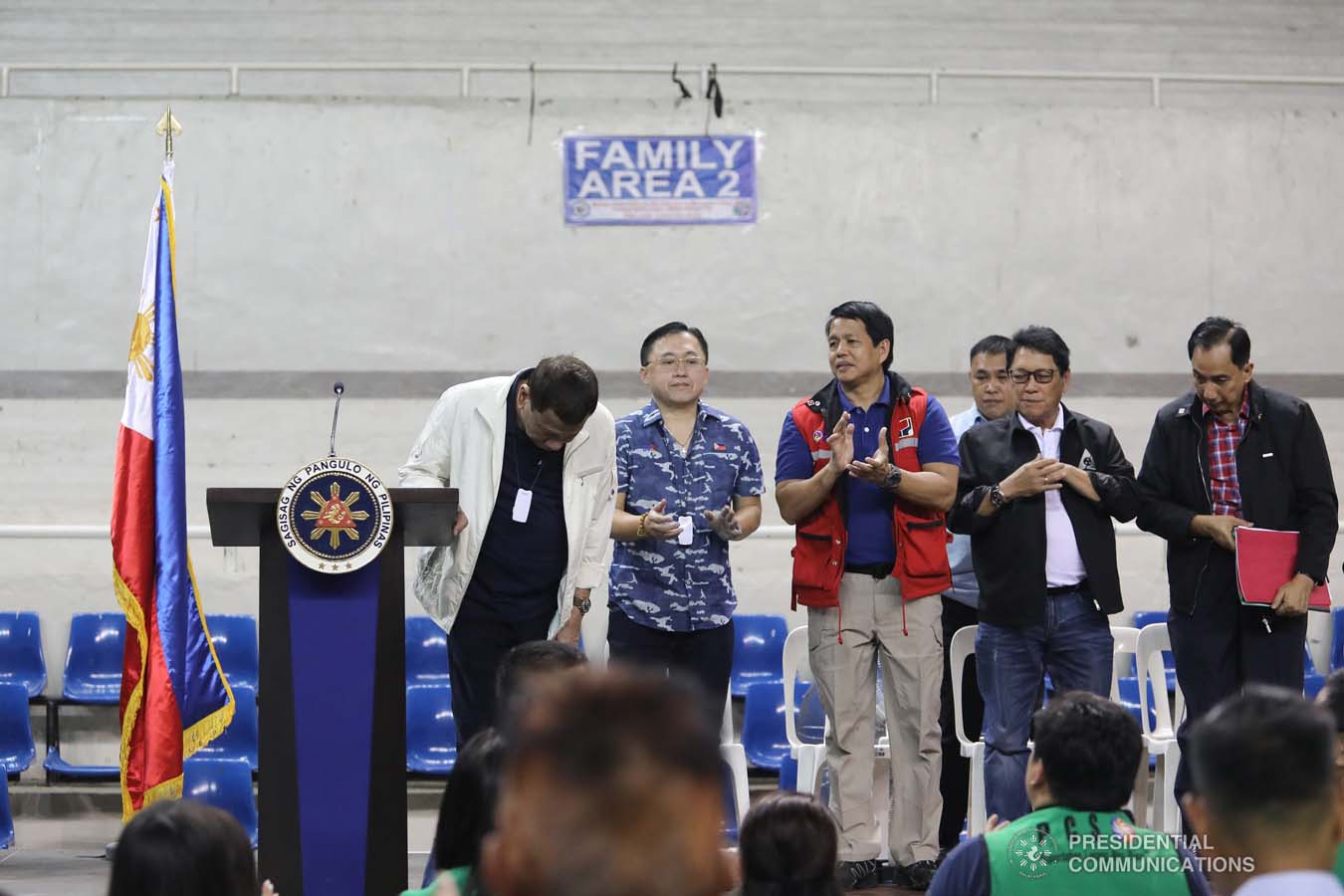 President Rodrigo Roa Duterte takes a bow before the families affected by the Taal Volcano eruption after delivering a speech during his visit at the Batangas City Sports Coliseum on January 14, 2020. VALERIE ESCALERA/PRESIDENTIAL PHOTO
