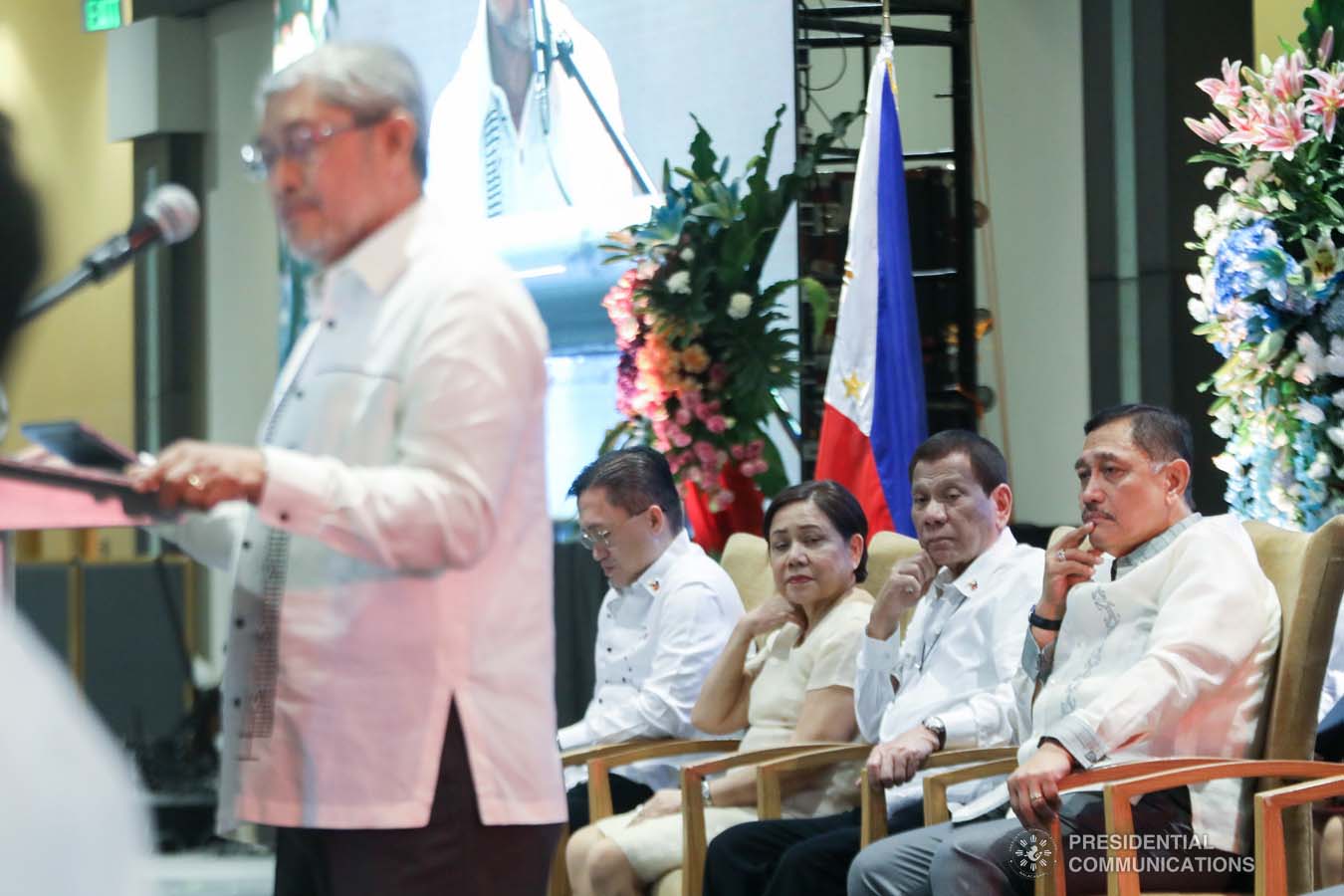 President Rodrigo Roa Duterte listens to the opening remarks of Bible Believers League for Morality and Democracy (BIBLEMODE) International Secretary General Reuben Abante during the celebration of the 120-year presence of the Baptist Churches in the Philippines at the SMX Convention Center in Pasay City on January 16, 2020. ACE MORANDANTE/PRESIDENTIAL PHOTO