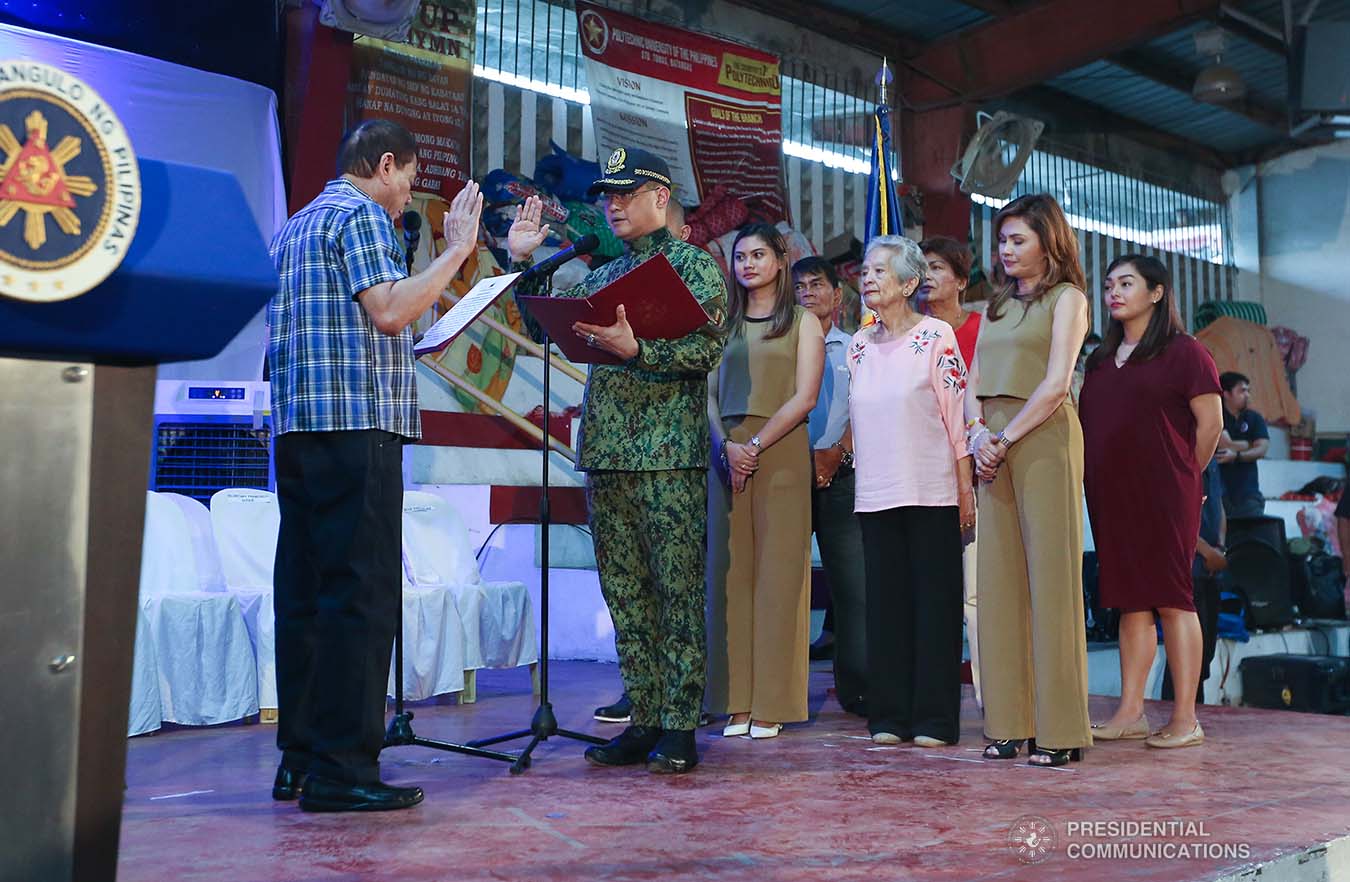 President Rodrigo Roa Duterte administers the oath to newly appointed Philippine National Police Chief Police Lieutenant General Archie Gamboa during a ceremony at the Polytechnic University of the Philippines-Sto. Tomas Campus in Sto. Tomas City, Batangas on January 20, 2020. VALERIE ESCALERA/PRESIDENTIAL PHOTO