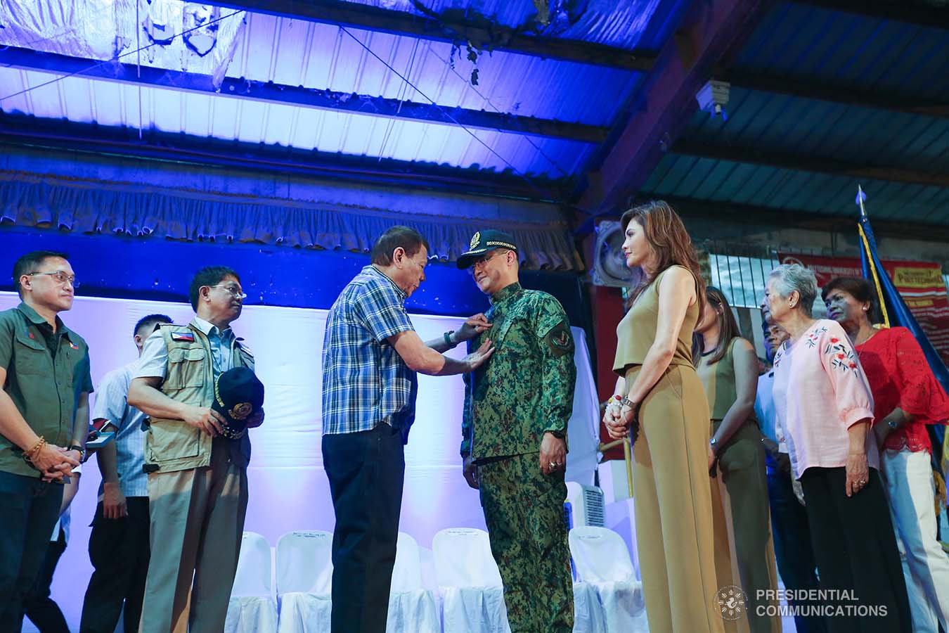 President Rodrigo Roa Duterte pins the rank insignia on newly-appointed Philippine National Police (PNP) chief Lieutenant General Archie Gamboa during a ceremony at the Polytechnic University of the Philippines-Sto. Tomas Campus in Sto. Tomas City, Batangas on January 20, 2020. VALERIE ESCALERA/PRESIDENTIAL PHOTO