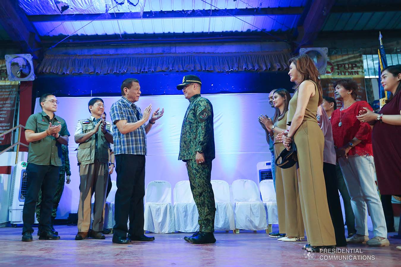 President Rodrigo Roa Duterte applauds after administering the oath to newly-appointed Philippine National Police (PNP) chief Lieutenant General Archie Gamboa during a ceremony at the Polytechnic University of the Philippines-Sto. Tomas Campus in Sto. Tomas City, Batangas on January 20, 2020. VALERIE ESCALERA/PRESIDENTIAL PHOTO