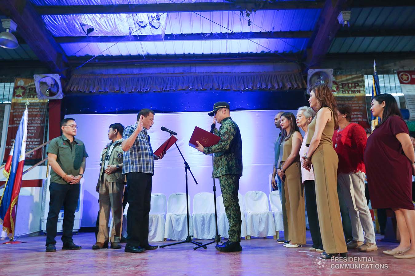 President Rodrigo Roa Duterte administers the oath to newly appointed Philippine National Police Chief Police Lieutenant General Archie Gamboa during a ceremony at the Polytechnic University of the Philippines-Sto. Tomas Campus in Sto. Tomas City, Batangas on January 20, 2020. VALERIE ESCALERA/PRESIDENTIAL PHOTO