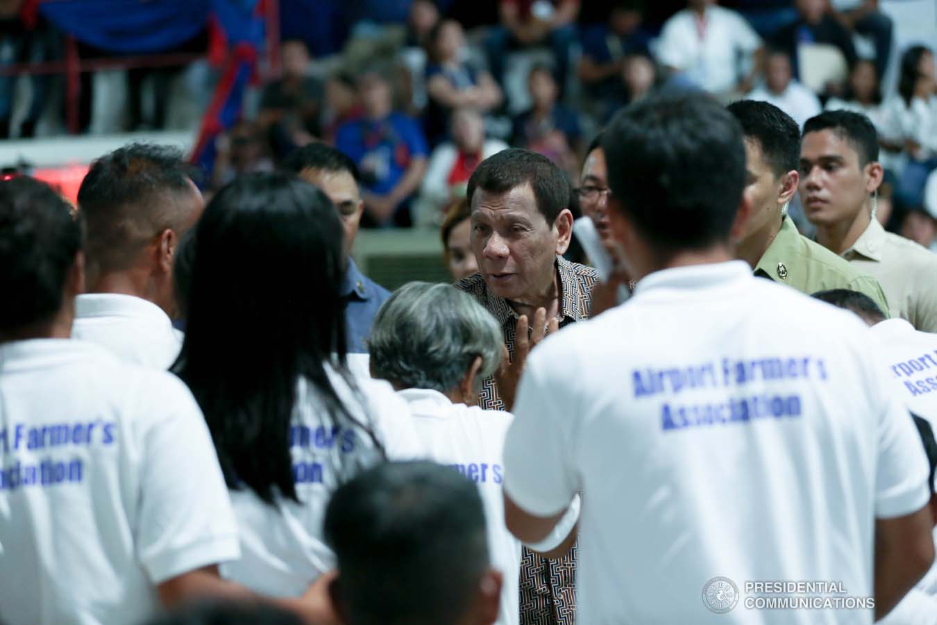 President Rodrigo Roa Duterte greets former rebels before distributing their benefits during a ceremony at the San Isidro Central School in Leyte on January 23, 2020. KARL NORMAN ALONZO/PRESIDENTIAL PHOTO