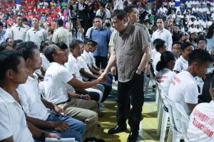 President Rodrigo Roa Duterte greets former rebels before distributing their benefits during a ceremony at the San Isidro Central School in Leyte on January 23, 2020. KARL NORMAN ALONZO/PRESIDENTIAL PHOTO