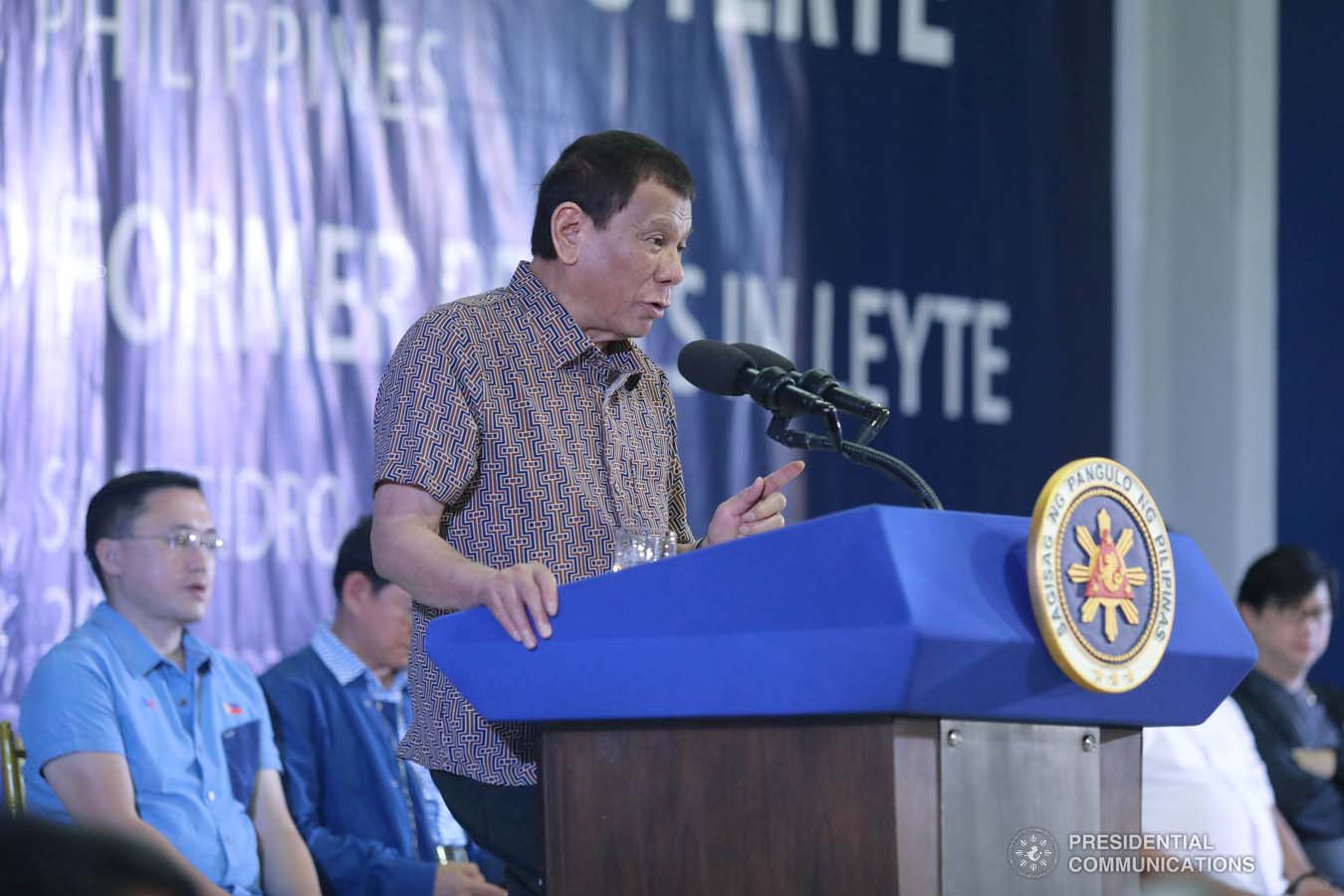 President Rodrigo Roa Duterte delivers a speech after leading the distribution of benefits to former rebels at the San Isidro Central School in Leyte on January 23, 2020. VALERIE ESCALERA/PRESIDENTIAL PHOTO
