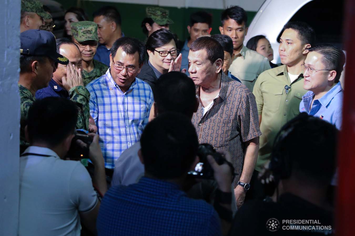 President Rodrigo Roa Duterte salutes a military officer upon his arrival at the San Isidro Central School to lead the distribution of benefits to former rebels in Leyte on January 23, 2020. VALERIE ESCALERA/PRESIDENTIAL PHOTO