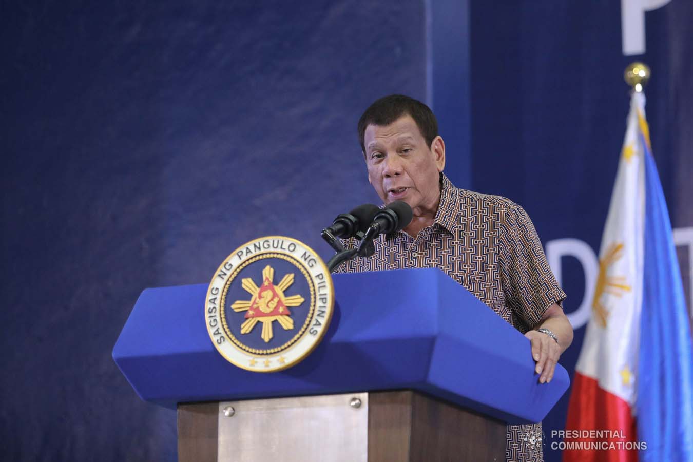 President Rodrigo Roa Duterte delivers a speech after leading the distribution of benefits to former rebels at the San Isidro Central School in Leyte on January 23, 2020. VALERIE ESCALERA/PRESIDENTIAL PHOTO