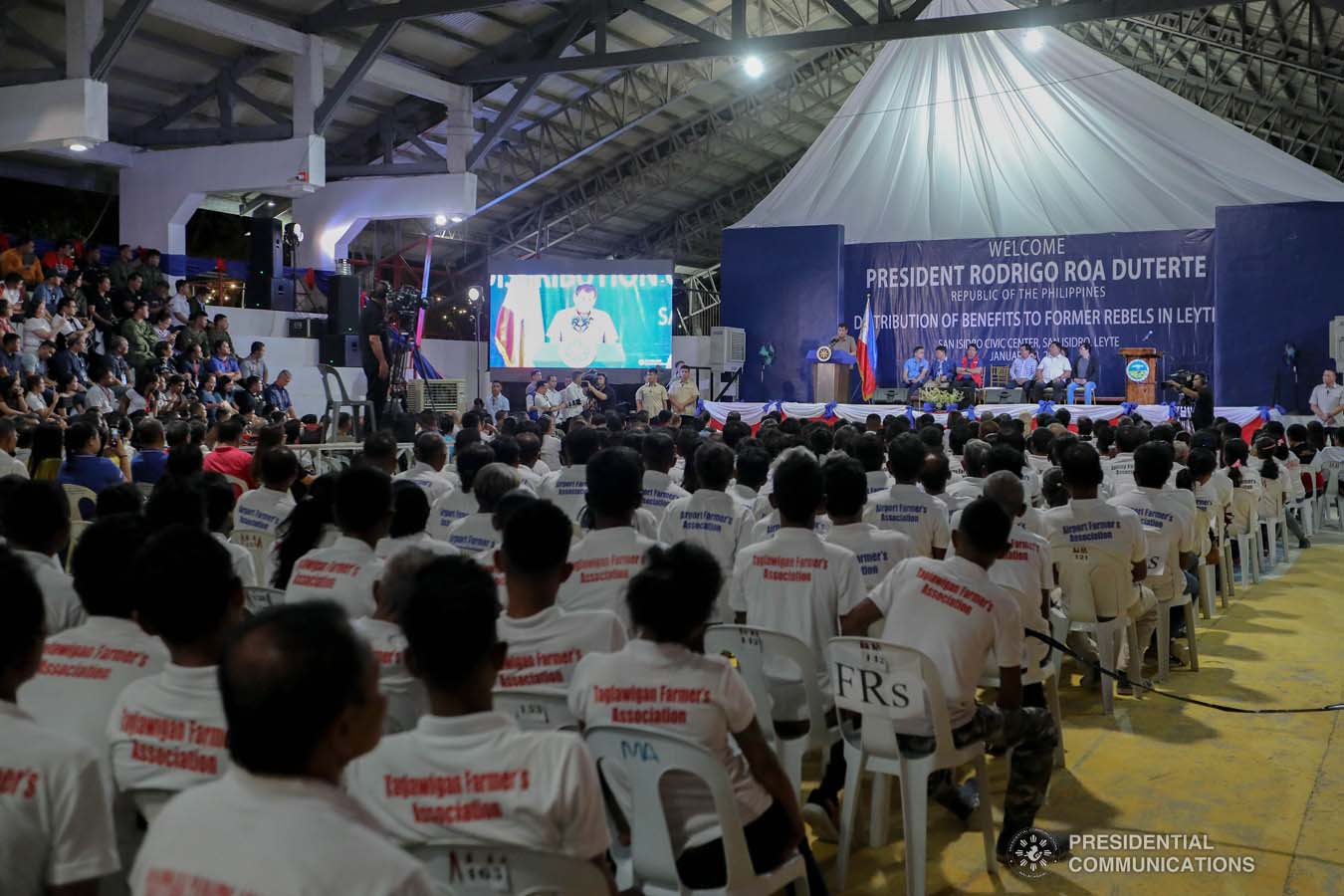 President Rodrigo Roa Duterte delivers a speech after leading the distribution of benefits to former rebels at the San Isidro Central School in Leyte on January 23, 2020. VALERIE ESCALERA/PRESIDENTIAL PHOTO