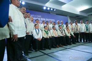 President Rodrigo Roa Duterte poses for posterity with some of the distinguished guests during the thanksgiving gathering with The Fraternal Order of Eagles (TFOE) at the SMX Convention Center in Davao City on January 17, 2020. JOEY DALUMPINES/PRESIDENTIAL PHOTO