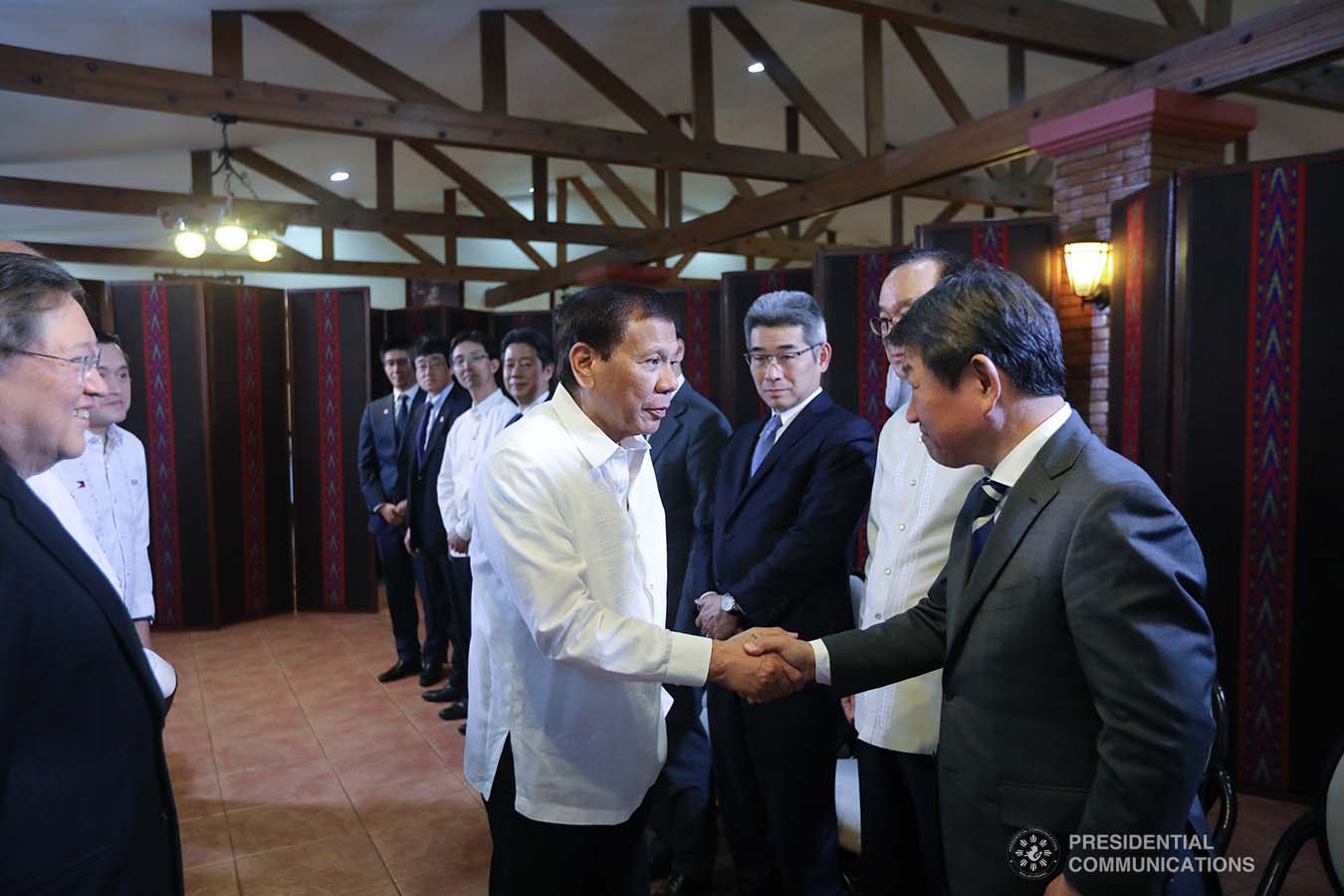 President Rodrigo Roa Duterte greets Japanese Foreign Minister Toshimitsu Motegi, who paid a courtesy call on the President at the Malacañang Golf Clubhouse in Manila on January 9, 2020. ALFRED FRIAS/PRESIDENTIAL PHOTO