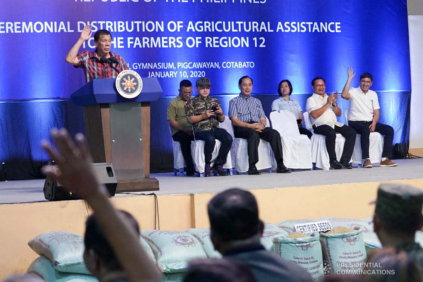 President Rodrigo Roa Duterte delivers a speech during the ceremonial distribution of agricultural assistance to farmers of Region 12 at the Pigcawayan Municipal Gymnasium in Cotabato on January 10, 2020. With the President are Senator Christopher "Bong" Go and Agriculture Secretary William Dar. ARMAN BAYLON/PRESIDENTIAL PHOTO