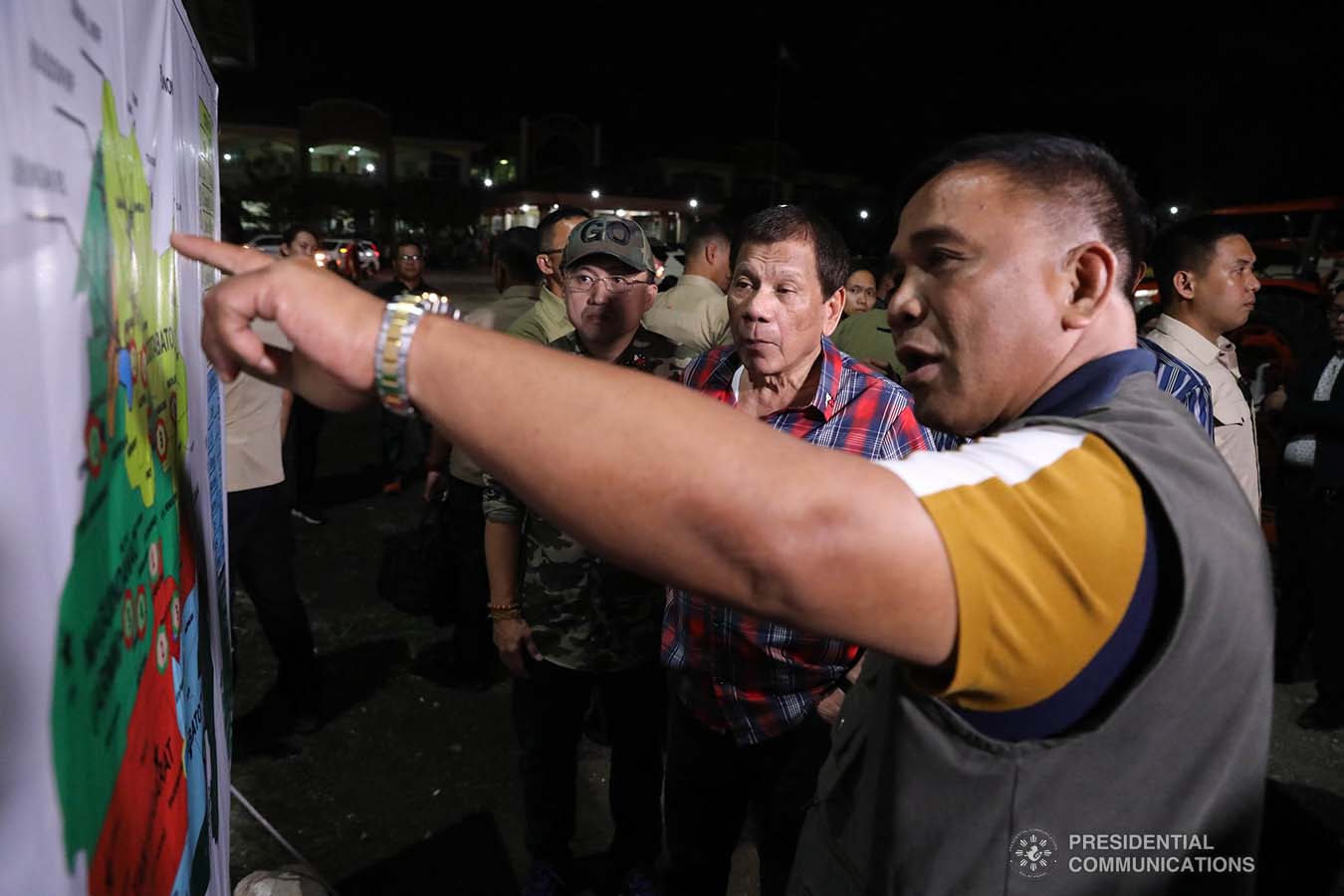 President Rodrigo Roa Duterte listens to the briefing of National Irrigation Administration (NIA) Administrator Ricardo Visaya during the ceremonial distribution of agricultural assistance to the farmers of Region 12 at the Pigcawayan Municipal Gymnasium in Cotabato on January 10, 2020. ROBINSON NIÑAL JR./PRESIDENTIAL PHOTO