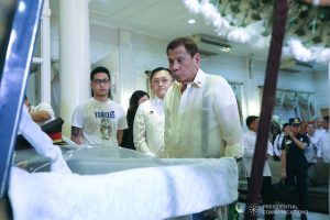 President Rodrigo Roa Duterte pays his last respects to the late Retired Police General Francisco Villaroman as he visited the wake at the Cosmopolitan Funeral Homes in Davao City on January 17, 2020. ROBINSON NIÑAL JR./PRESIDENTIAL PHOTO