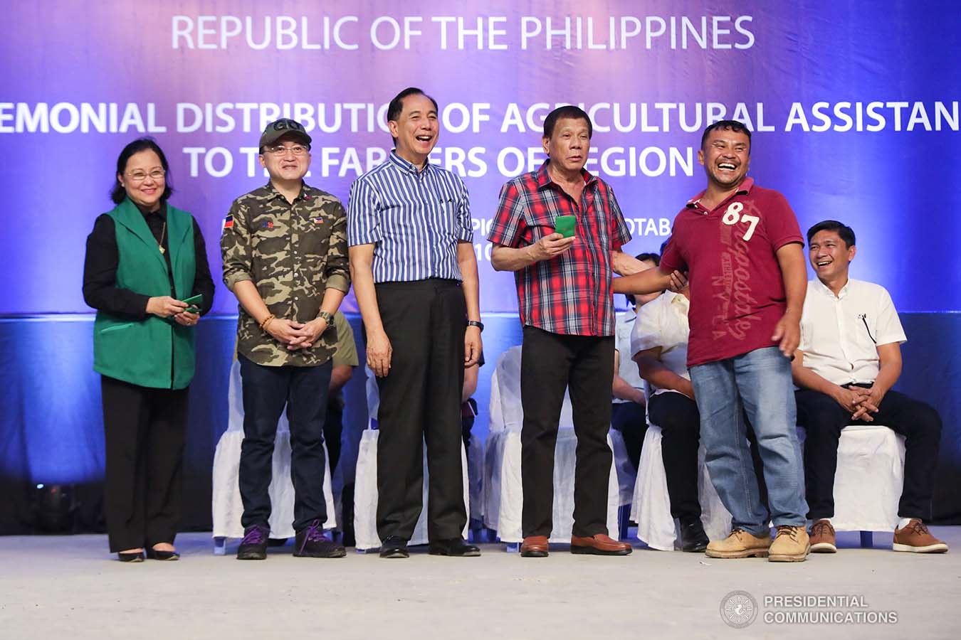 President Rodrigo Roa Duterte leads the ceremonial distribution of agricultural assistance to the farmers of Region 12 at the Pigcawayan Municipal Gymnasium in Cotabato on January 10, 2020. Also in photo are Senator Christopher "Bong" Go and Agriculture Secretary William Dar. SIMEON CELI JR./PRESIDENTIAL PHOTO