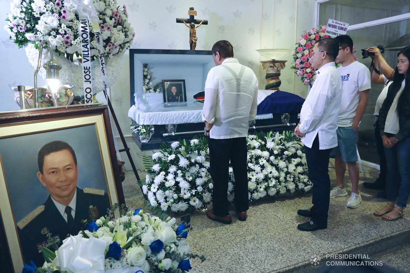 President Rodrigo Roa Duterte pays his last respects to the late Retired Police General Francisco Villaroman as he visited the wake at the Cosmopolitan Funeral Homes in Davao City on January 17, 2020. ROBINSON NIÑAL JR./PRESIDENTIAL PHOTO