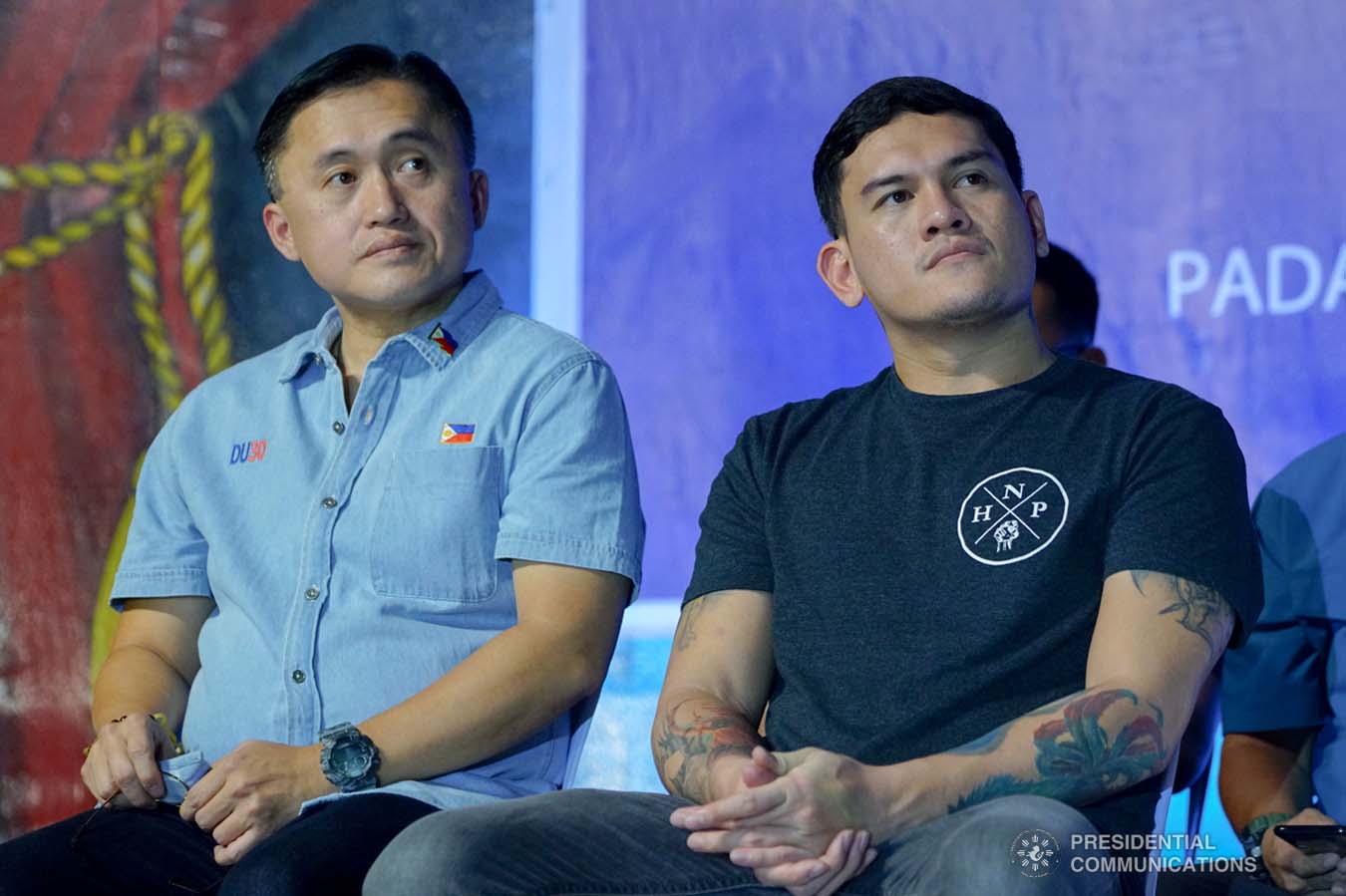 Davao City Vice Mayor Sebastian Duterte, who visited earthquake victims in Padada, Davao del Sur on behalf of his father President Rodrigo Roa Duterte, listens to the message of Padada Mayor Pedro Caminero Jr. at the Padada Central Elementary School on January 3, 2020. With the President's son is Senator Christopher "Bong" Go. RICHARD MADELO/PRESIDENTIAL PHOTO