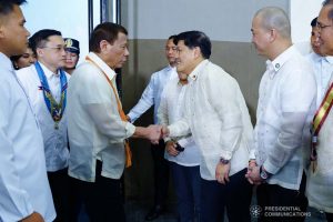 President Rodrigo Roa Duterte greets one of the guests during the thanksgiving gathering with The Fraternal Order of Eagles (TFOE) at the SMX Convention Center in Davao City on January 17, 2020. JOEY DALUMPINES/PRESIDENTIAL PHOTO