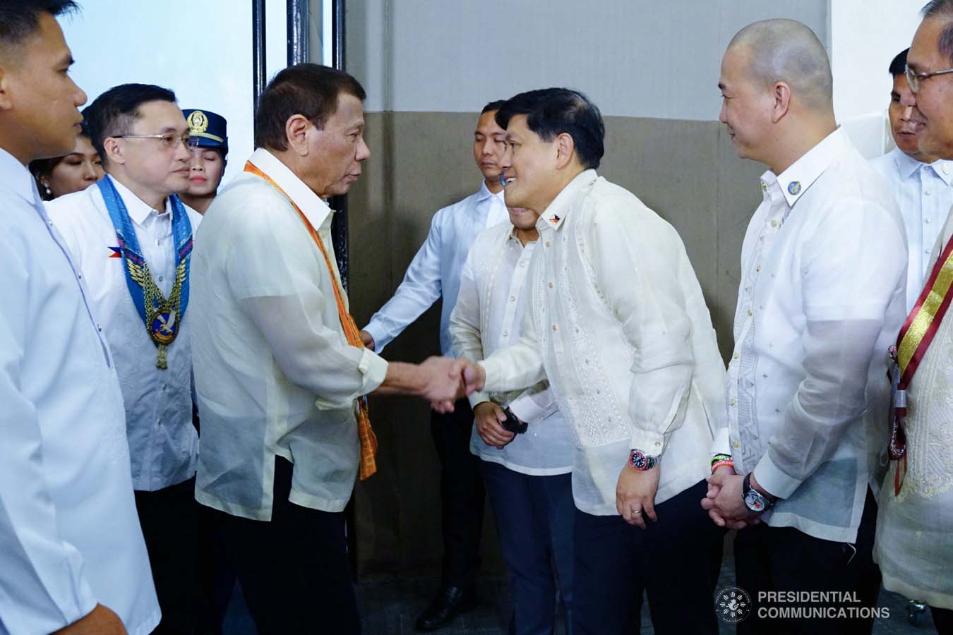 President Rodrigo Roa Duterte greets one of the guests during the thanksgiving gathering with The Fraternal Order of Eagles (TFOE) at the SMX Convention Center in Davao City on January 17, 2020. JOEY DALUMPINES/PRESIDENTIAL PHOTO