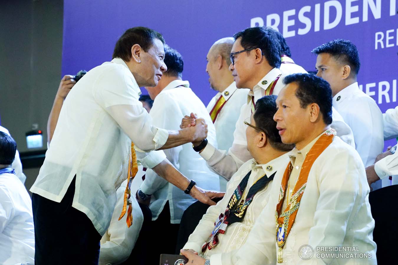 President Rodrigo Roa Duterte greets one of the guests during the thanksgiving gathering with The Fraternal Order of Eagles (TFOE) at the SMX Convention Center in Davao City on January 17, 2020. JOEY DALUMPINES/PRESIDENTIAL PHOTO