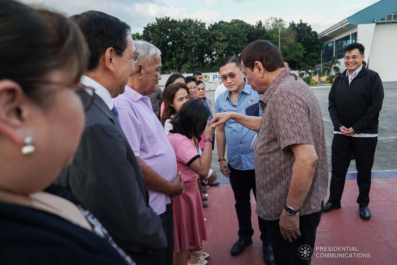 President Rodrigo Roa Duterte meets with the family of Overseas Filipino Worker (OFW) Roderick Aguinaldo, who is currently detained in Bahrain, as the President led their send-off at the Villamor Air Base in Pasay City on January 23, 2020. The family wil leave for Bahrain on Saturday. With the President is Senator Christopher "Bong" Go. KING RODRIGUEZ/PRESIDENTIAL PHOTO